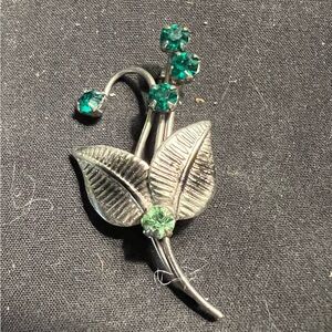 Silver Tone and Green Crystal Floral Brooch